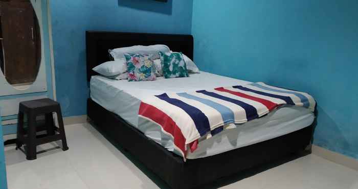 Kamar Tidur OYO 90763 Trisna Garden House