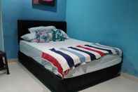 Kamar Tidur OYO 90763 Trisna Garden House