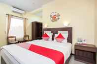 Kamar Tidur Capital O 887 Green Hill Hotel And Convention Center