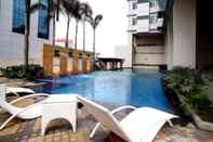 Swimming Pool The Exchange Regency Residence Hotel Managed by HII