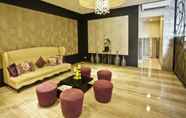 Lobby 2 The Exchange Regency Residence Hotel Managed by HII