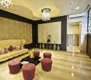 Lobby 2 The Exchange Regency Residence Hotel Managed by HII