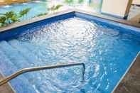 Swimming Pool The Exchange Regency Residence Hotel Managed by HII