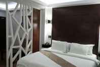 Bedroom DM Residente Hotel