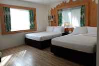 ห้องนอน Serviced Apartments by Eco Hotel Boracay