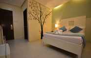 Kamar Tidur 6 Empire Suites Hotel