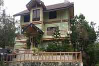 Bangunan The Green Cabin Bed & Breakfast