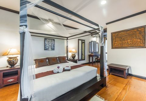 ห้องนอน Gassan Khuntan Golf & Resort