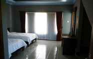 Kamar Tidur 7 Ridho Malik Hotel and Spa