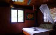 Kamar Tidur 7 La Salangane Caalan Beach Villa