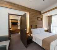 Bedroom 2 Grand Sierra Pines Hotel
