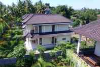 Bangunan Uma Capung Mas Cottages