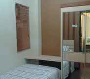 Bedroom 2 The Suites Metro By Citra