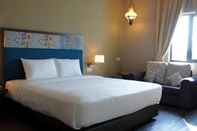 Kamar Tidur Hotel Zamburger Grand Jade