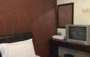 Kamar Tidur 6 Suntec Hotel