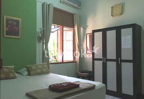 Bedroom Hatiga Homestay near Kebun Raya Bogor &  Botani Square