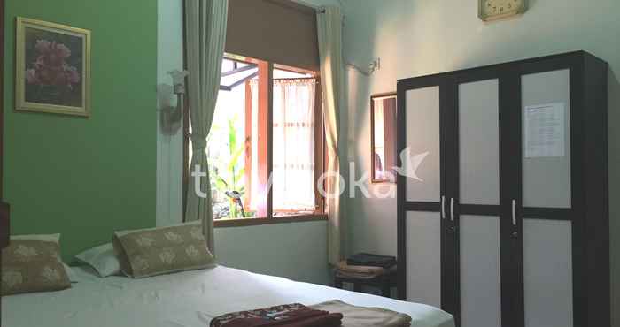 Bedroom Hatiga Homestay near Kebun Raya Bogor &  Botani Square