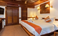 Phòng ngủ 2 Tropica Bungalow Hotel