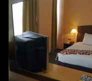 Bedroom 5 Hotel Caliber