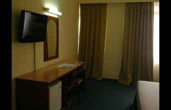 Bedroom 4 Hotel Caliber