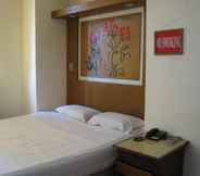 Kamar Tidur 3 Skyrise Hotel Apartelle and Restaurant