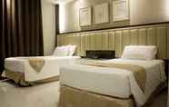 Bedroom 4 Crown Royale Hotel