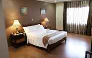 Bedroom 2 Crown Royale Hotel