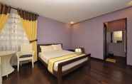 Kamar Tidur 3 Colione Bed & Breakfast