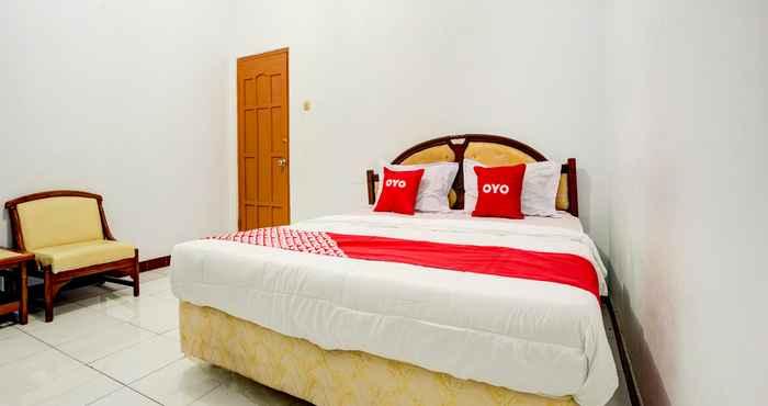 Bedroom OYO 90118 Hotel Diamond Syariah