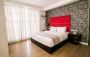 Kamar Tidur 4 Queen Margarette Hotel - Main