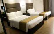 Kamar Tidur 4 Queen Margarette Hotel Downtown