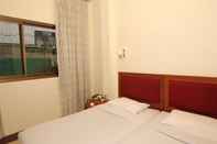 Kamar Tidur River Inn Hotel