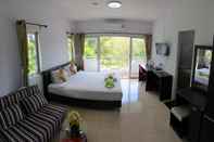 Kamar Tidur Swiss Chalet Guest House