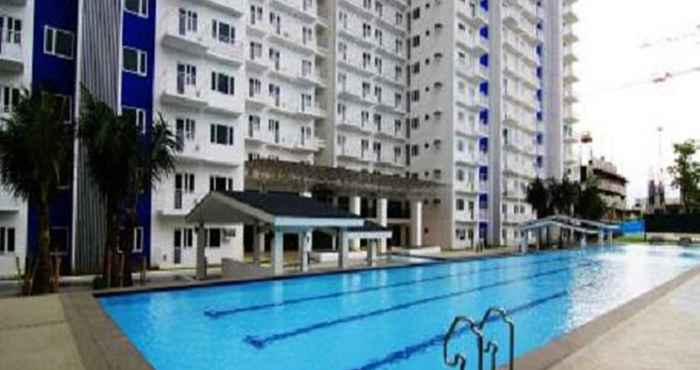 Kolam Renang Grass Residences I by JG Vacation Rentals