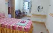 Kamar Tidur 3 Golden Success Hotel - Mangaldan