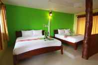 ห้องนอน Tharathip Resort (SHA Extra Plus)