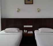 Bedroom 6 Grand Malindo Hotel.