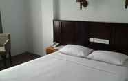 Bedroom 3 Grand Malindo Hotel.