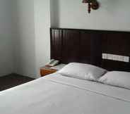 Bedroom 3 Grand Malindo Hotel.