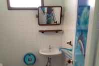 ห้องน้ำภายในห้อง Yu Yu Gloden Beach Resort