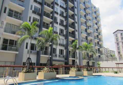Exterior Palm Tree Genlex Condominium