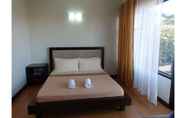 Kamar Tidur 4 Gardenville Hotel