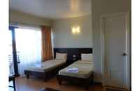 Kamar Tidur Gardenville Hotel