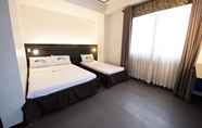 Kamar Tidur 4 Hotel Henrico Kisad