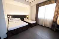 Kamar Tidur Hotel Henrico Kisad