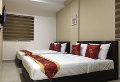 卧室 5 Global Inn Hotel