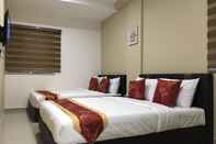Bedroom Global Inn Hotel