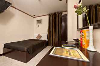 Kamar Tidur 4 Oyster Plaza Hotel