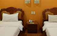 Kamar Tidur 7 A and A Plaza Hotel