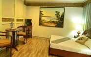 Kamar Tidur 4 Holiday Plaza Hotel